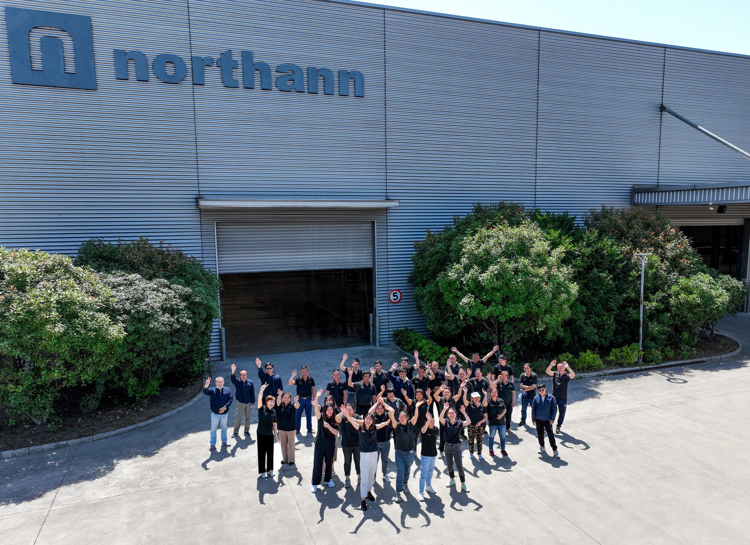 The Northann team outside the company’s production building